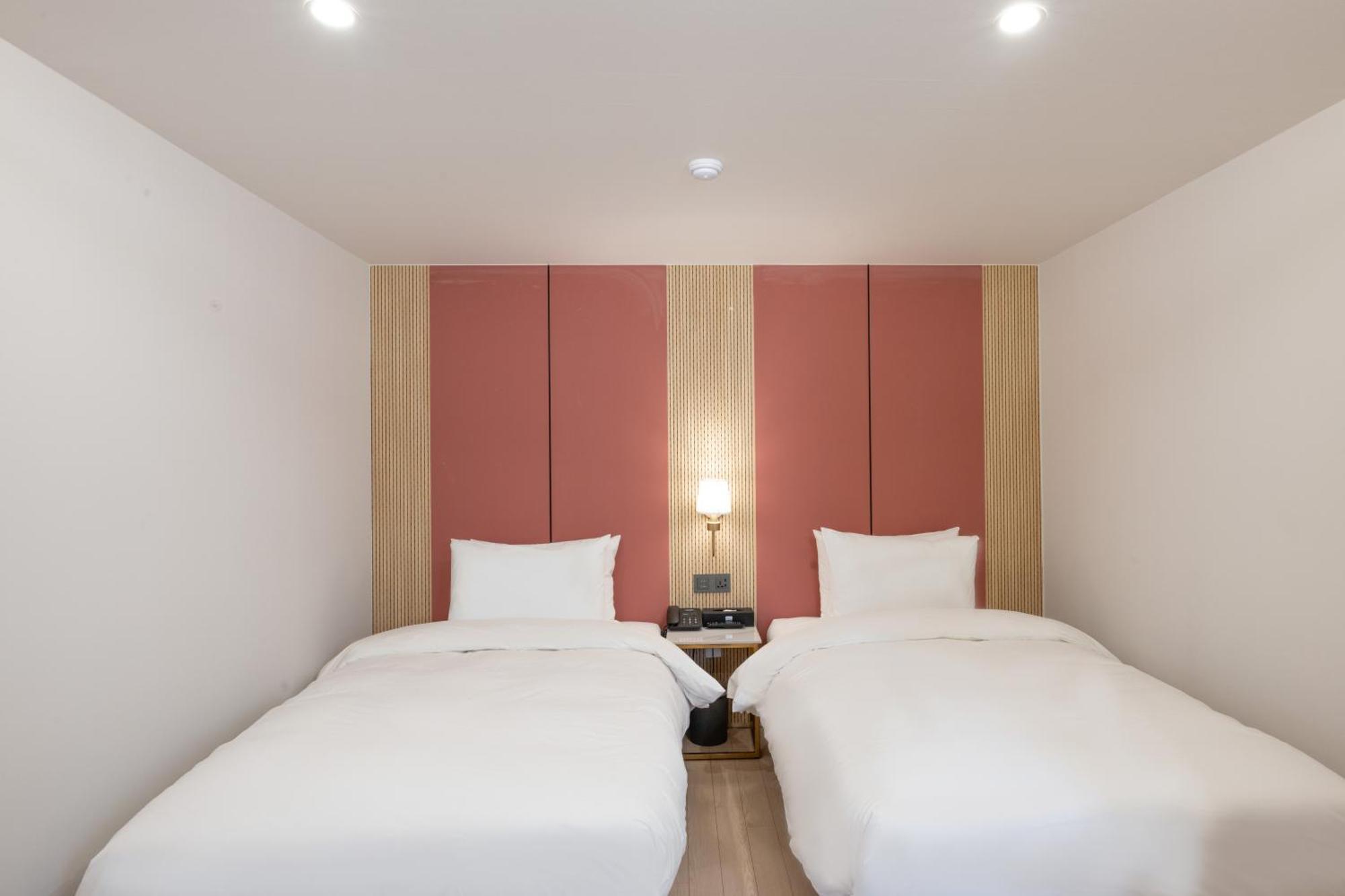 Hotel Bellus Busan Bagian luar foto