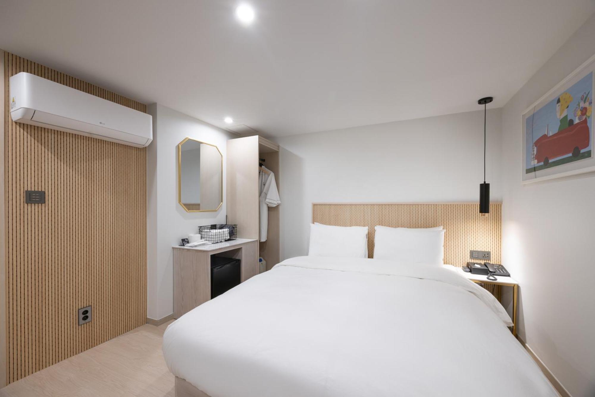 Hotel Bellus Busan Bagian luar foto