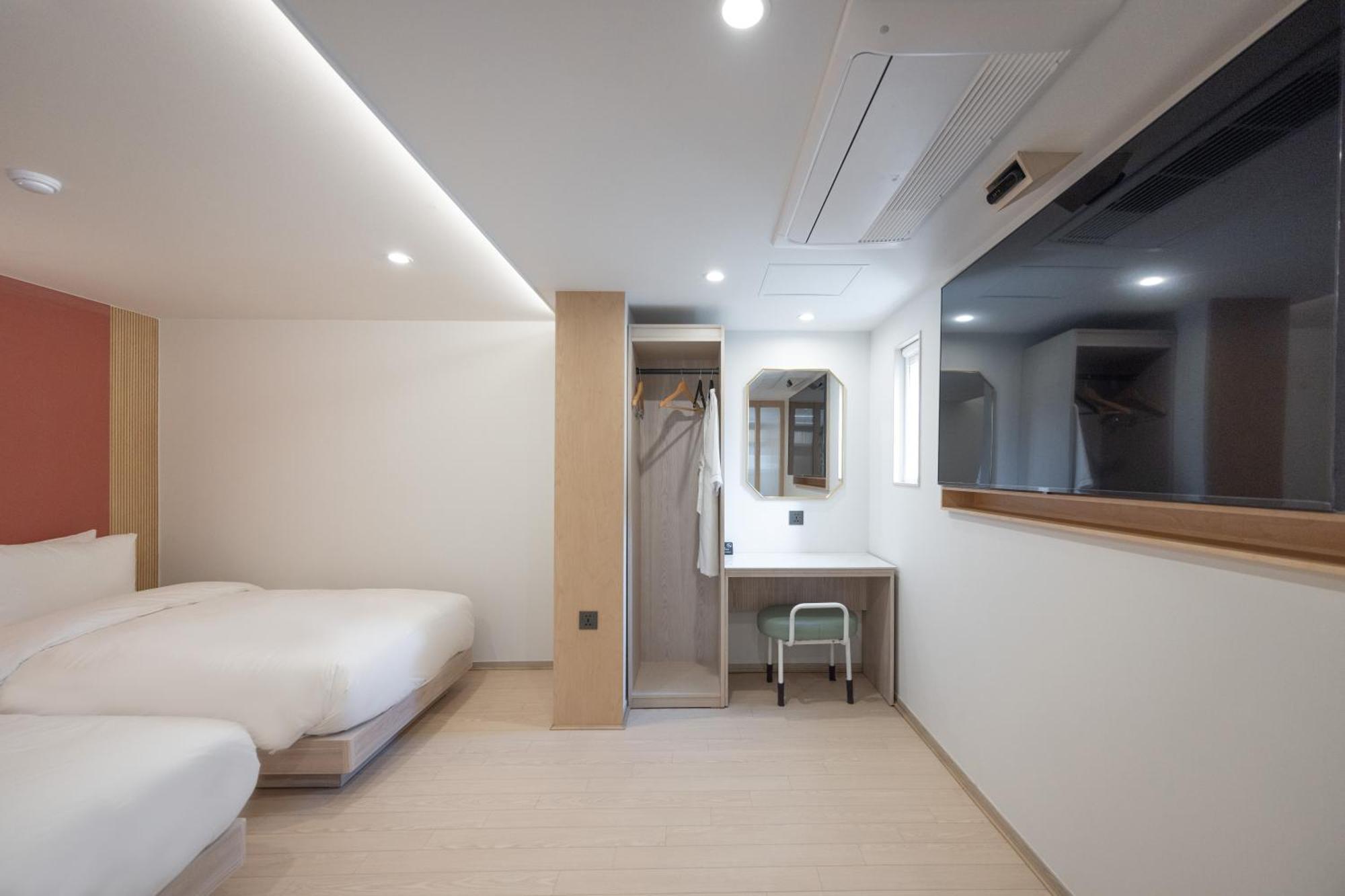 Hotel Bellus Busan Bagian luar foto
